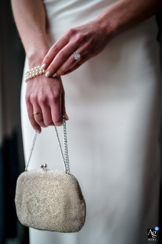 A beautifully composed wedding photo showcasing the bride's stunning ring, delicate bracelet, and cherished heirloom purse, taken at The Thompson Hotel in Washington DC