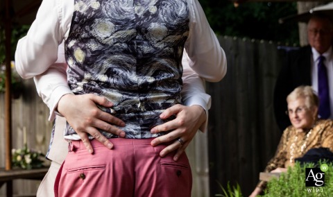 The couple share their romantic first dance together at Red's Beer Garden in Atlanta, Georgia, surrounded by the casual and festive atmosphere of their outdoor wedding reception.