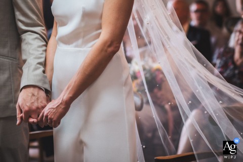 Urrugne Town Hall, Pyrénées Atlantiques: Close-up of Newlyweds' Entwined Hands During Civil Ceremony Close-up of newlyweds’ entwined hands during civil ceremony at Urrugne Town Hall, Pyrénées Atlantiques.