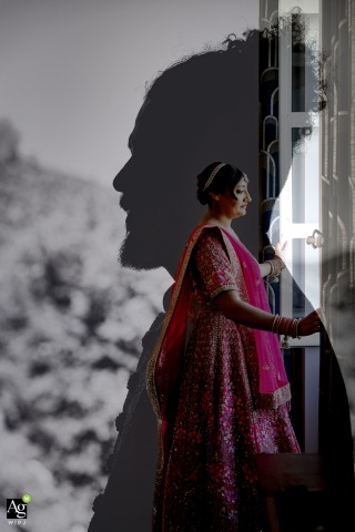 A creative double exposure portrait at Château De Chaulnes in Noyarey, France, blends scenes of the bride and groom as they prepare for their upcoming wedding ceremony.