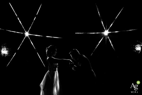 At the Domaine de la Grangette in Montagnac, France, the bride and groom perform their first dance together, surrounded by the warm atmosphere of their reception venue.