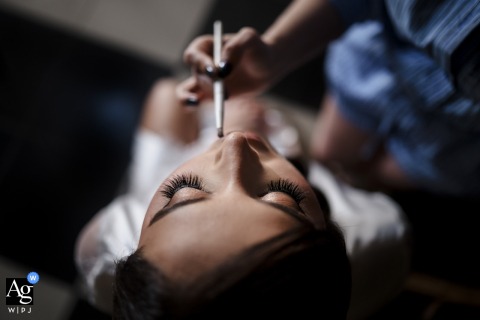 Close-up of bride’s face during makeup at Zephyr Palace, Villa Caletas Hotel, Jaco, Costa Rica.