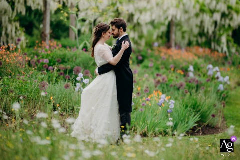 Gravetye Manor: Intimate Couple's Portrait Amidst Vibrant Floral Gardens Couple shares a quiet, intimate session together in the vibrant floral gardens at Gravetye Manor.