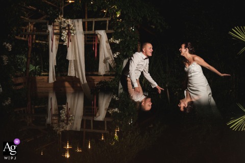 Happy couple's reflection below, captured during a brief escape from the dancefloor party at Nouvelle grange de la Chevallerie, Angers.