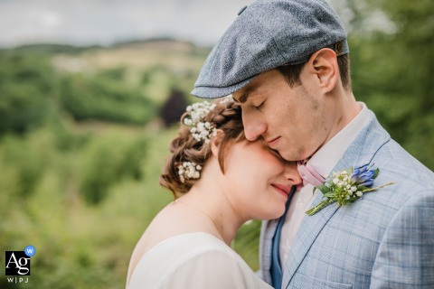 Softly Colored Intimate Hug Between Couple in Lindlar, Germany An intimate hug between the bride and groom, captured with soft colors in Lindlar, Germany.