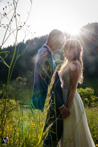 Couple's Portrait at La Grange Aux Fées with Sunlight Burst from Behind A couple's portrait with a burst of sunlight from behind at La grange aux fées, Autrans.