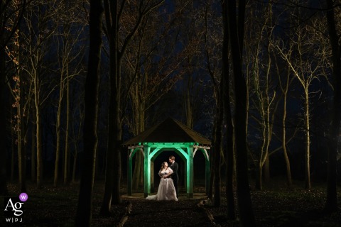 Couple in Woods at Stratton Court Barn, Backlit by Green Gel Light Couple in the woods at Stratton Court Barn, illuminated with a green gel light from behind.
