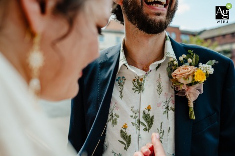 The Couple Shares A Quiet Moment In Sheffield Before Their Ceremony Highlighting Personal Fashion Details Detail Meeting on the street in Sheffield before their ceremony, the bride and groom share a quiet moment together as the photographer captures their personal details and attire.