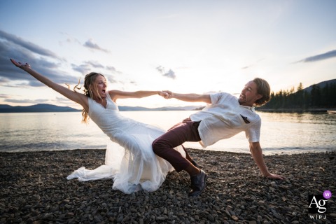 Amid the sunset's warm glow at Beyond Hope Resort in Idaho, the bride and groom share an intimate, artistic dance during their wedding day portrait session.