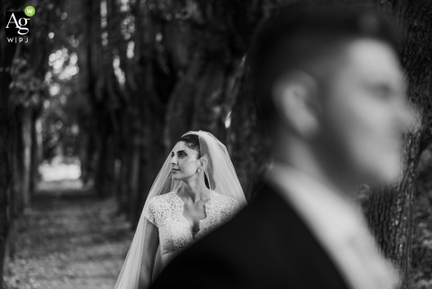 The couple pose for a timeless wedding portrait at Vigna Chinet in Torino, showcasing the elegant architecture and romantic atmosphere of the Piedmont region of Italy.