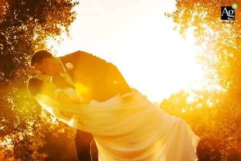 A timeless and elegant couple portrait is set against the rolling hills and rustic charm of Podere San Giorgio, highlighting the quintessential beauty of the Tuscan countryside.