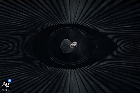 Nanping, Fujian, hotel — The couple appears together in a bold and dramatic double portrait, centered within a dark frame that enhances the atmosphere and intimacy of the wedding image.