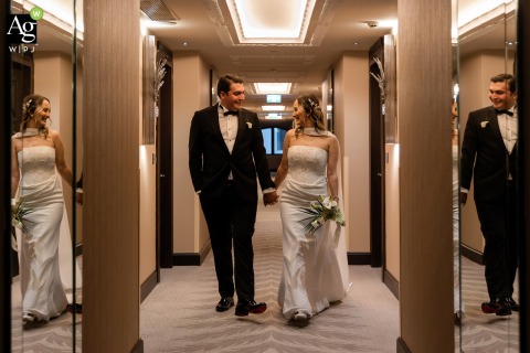 The bride and groom pose for a timeless wedding portrait at the Wyndham Grand Kalamış, utilizing the sophisticated atmosphere of this luxury Istanbul, Turkey venue.