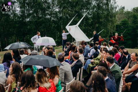At Salomons Estate England Gazebo Structure Appears Turned Upside Down by Wind Salomons Estate, near Tunbridge Wells, England, features a whimsical, artistic interpretation where the gazebo structure appears to be turned upside down by a strong gust of wind on the wedding day.