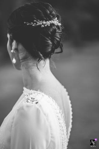 At Estancia Santa Lucia Bride's Delicate Gown Embroidery Headdress and Earrings At Estancia Santa Lucia, the delicate details of the bride's attire, including the intricate gown embroidery, elegant headdress, and stunning earrings, are captured in this artistic wedding day photograph.