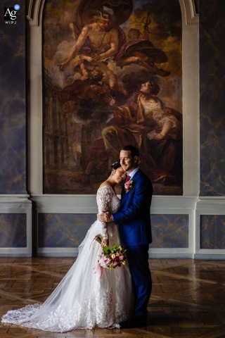 Mairie de Nancy — The couple is captured in a low-angle, minimalist vertical portrait inside the Mairie de Nancy, highlighting their connection against the elegant architectural setting.