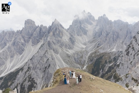 Dolomites, Italy: The dramatic landscape of the Dolomites, Italy, provides a breathtaking artistic backdrop for a high-mountain elopement ceremony, held after a strenuous one-hour hike with the officiant and just a few close guests.