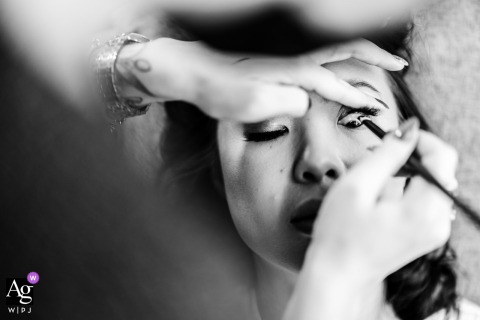 At An Airbnb In Dennis, Massachusetts, An Extreme Close-Up Shows The Sculptural Detail Of Makeup Application Becoming A Graphic Vignette At an Airbnb in Dennis, Massachusetts, an extreme close-up highlights the sculptural detail of makeup application, turning wedding prep into a graphic vignette.