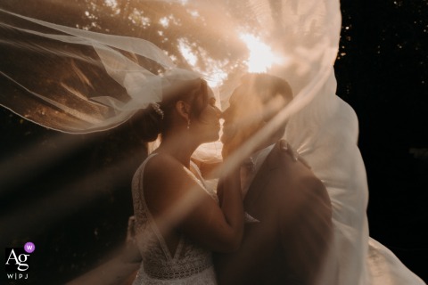 A Moulin de Lambouray’s Photograph Features Romantic Fabric Details Elegantly Framed In The French Countryside At Moulin de Lambouray, a photograph titled "Veil of Love" features romantic fabric details, elegantly framed in the peaceful French countryside setting.