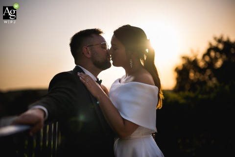 Pair Portrait Captured at Sunset in Château d'Aubiac France During Their Wedding Portrait Session The couple is featured in a straightforward wedding portrait during sunset at Château d'Aubiac, France, documenting the pair in the venue’s setting.