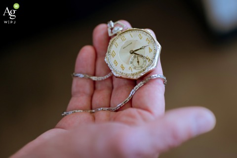 Waltham Pocket Watch from 1890s Is Photographed at Sens Hotel in Montreal Quebec A Waltham pocket watch, preserved from the 1890s and passed down from the groom’s great uncle, is highlighted at Sens Hotel in Montreal, Quebec, as an important family heirloom for the wedding.