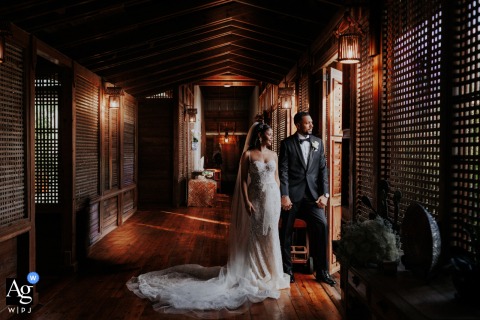   At Ohana Villa in Tobago, a quiet portrait is taken after the couple’s first look, the relaxed setting capturing their anticipation before the ceremony.