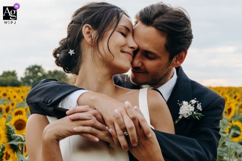 The Couple Embraces In A Tranquil Outdoor Setting On The Indre Property, Their Loving Connection Highlighted For The Portrait On the same property in Indre, the couple embraces, their loving connection highlighted in a tranquil outdoor setting.