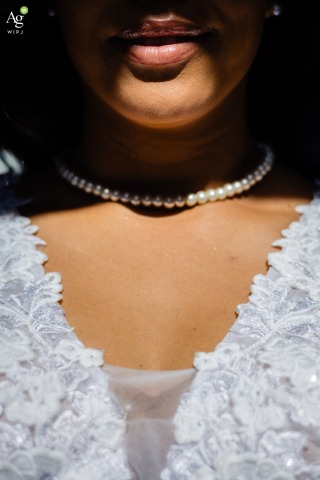 Bride’s Lip Detail and Makeup Expression Highlighted Before Events Begin at Chateau de Beaujeu A close-up shot focuses on the bride’s lips at Chateau de Beaujeu, highlighting detail work in her makeup and expression before the main events.