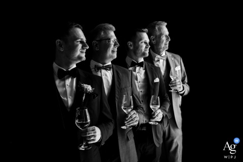 A Playful Group Portrait Features The Wedding Boys Together At A Swiss Venue With Distinguished Style A playful group portrait called “All the boys” features the wedding party together at a Swiss venue, camaraderie and style on full display.
