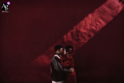 Portrait Of Bride And Groom At A Temple In Nanping, Fujian, Enhanced By A Spiritual And Significant Setting A portrait of the bride and groom is taken at a temple in Nanping, Fujian, with the spiritual setting enhancing the significance of their wedding day.