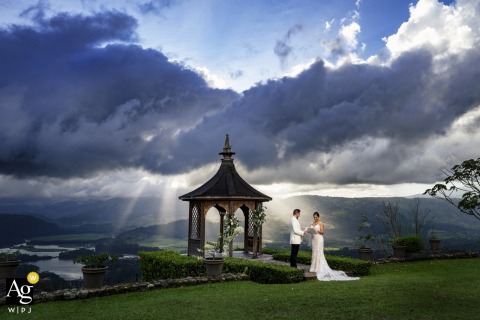 Sunset At The Gazebo Of Hacienda Sitio De Mata Frames The Couple Exchanging Vows In Vibrant Evening Light At the gazebo of Hacienda Sitio de Mata during a stunning sunset, the bride and groom exchange vows, with vibrant evening light framing their ceremony scene.