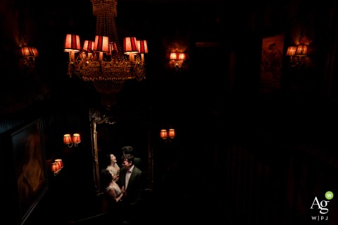 Bride and Groom Radiate Love and Excitement While Posing Together in Washington DC Under Lights The bride and groom pose together in Washington, DC, their expressions radiating love and excitement as they mark their special day.