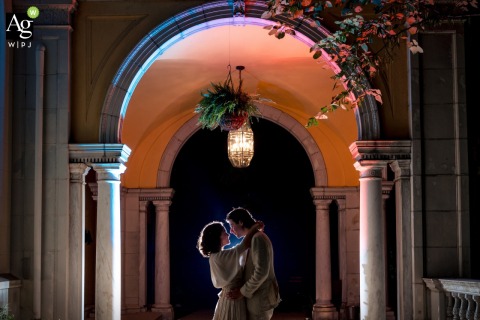 Quiet Affectionate Embrace Framed by Elegant Architecture at Josephine Butler in Washington DC During their portrait session at Josephine Butler in Washington, DC, the bride and groom share a quiet, affectionate embrace, framed by elegant architecture and soft natural light.