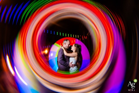Dazzling Rainbow Lightpainting Turns the Night Into a Creative Celebration Outside Zuid Holland Venue Outside the wedding venue in Zuid Holland, a dazzling lightpainting with rainbow colors lights up the night, turning the celebration into a vibrant and creative spectacle.