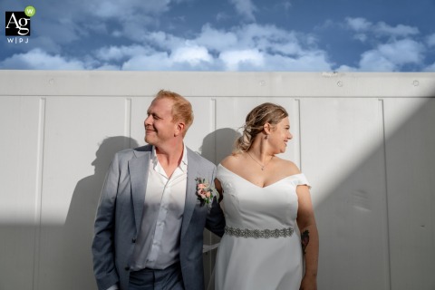 Contrasting Light and Shifting Sunset Set the Reflective Mood on Zuid Holland Beach On the beach in Zuid Holland, contrasting light highlights the shifting moods of the scene, prompting reflection on choice and direction as the sun sets.