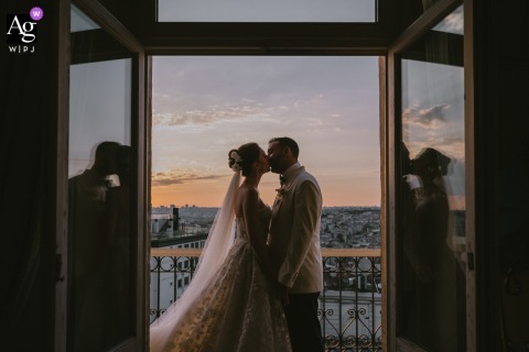Pera Palace In Istanbul Glows At Sunset, Historic Hotel Architecture Providing A Striking Romantic Scene For The Wedding At Pera Palace in Istanbul, the venue is bathed in sunset light, casting a warm glow over the historic architecture and elevating the sense of romance.