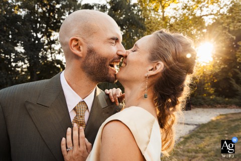 Sunset Gently Illuminates The Couple As They Kiss At Chateau Lacoste In Lupiac, Gers, France, Creating Romance Sunset gently lights the couple as they kiss at Chateau Lacoste in Lupiac, Gers, France, the golden hour providing a romantic backdrop to their embrace.