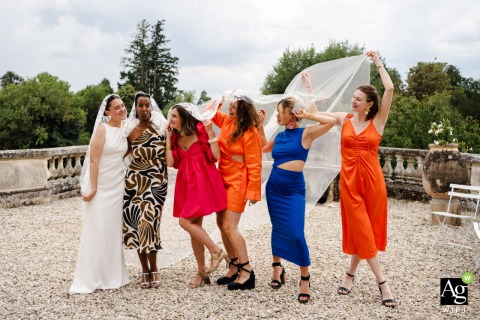 Bride’s Witnesses Gather At Domaine Des Croisettes In Isère, Joy Reflects In Portrait Witnesses for the bride gather together at Domaine des Croisettes en Isère, their camaraderie and excitement perfectly reflecting the joyous portrait.