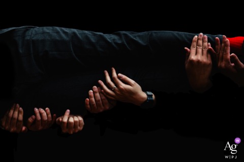 Groom And Best Man Play Pre-Wedding Games At Home In Zhanjiang Guangdong At home in Zhanjiang, Guangdong, the groom and his best man engage in pre-wedding games, adding a personal touch to the start of the celebration in a comfortable setting.