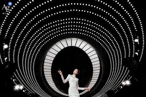 Bride Posed In Traditional Wedding Attire At Zhanjiang Guangdong Ceremony Another view from the ceremony location in Zhanjiang, Guangdong presents the bride in a traditional wedding day portrait, emphasizing the elegance and cultural setting of the event.