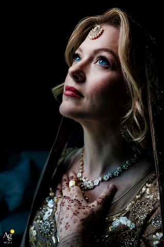 Bride Posed In Hotel Room At The Peninsula Istanbul Hotel Before Ceremony In her hotel room at The Peninsula Istanbul Hotel, the bride is photographed in a poised portrait, the refined interior highlighting her calm anticipation before the ceremony.