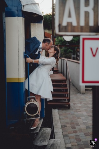 At the ceremony venue at Village de Sully, Yvelines, France, a real train station is transformed for a special photoshoot, blending wedding tradition with unique travel-inspired elements.