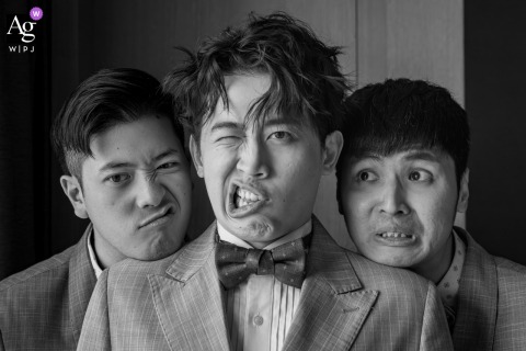 At Four Points by Sheraton Taipei Bali in Taiwan, the groom and his groomsmen pull exaggerated funny faces together, creating a lighthearted and memorable moment before the wedding festivities.