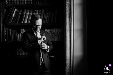 At Domaine des Saints Pères in Montagnole, Savoie, France, the groom is photographed in an elegant portrait, highlighting his composed expression and refined wedding-day style.