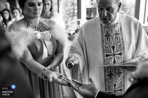 Lake Tahoe bride and priest during the ceremony at the Church Lake Tahoe bride and priest during the ceremony at the Church - California wedding photo