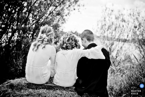 Netherlands Documentary Wedding Photographer - ZH | Image contains: sitting relaxing wedding day