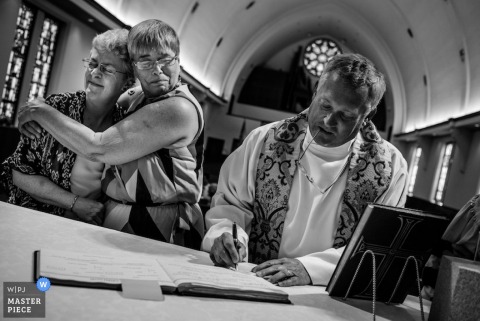 Marriage certificate signing after a Georgia wedding ceremony Marriage certificate signing after this Georgia wedding ceremony.