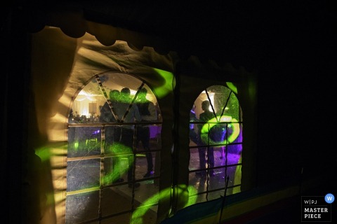 London guests enjoying the reception at night - England wedding reportage photography