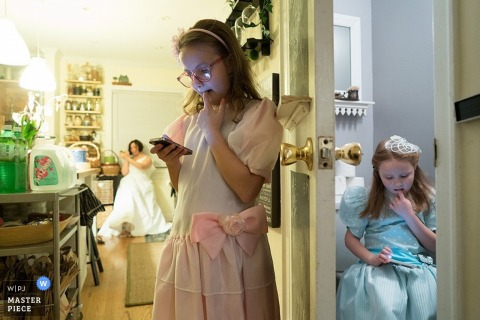 Bronx kids play on phones while bride gets ready for wedding | New York City wedding photography