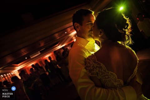 Phuket bride and groom dancing at the reception of a Thailand wedding Phuket bride and groom dancing at the reception | Thailand wedding photojournalism